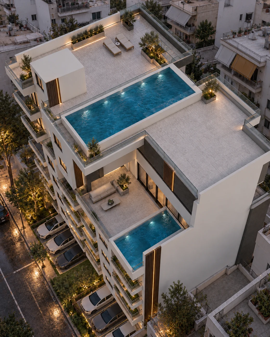 Ilektras 7–9 · Aerial rooftop view at dusk